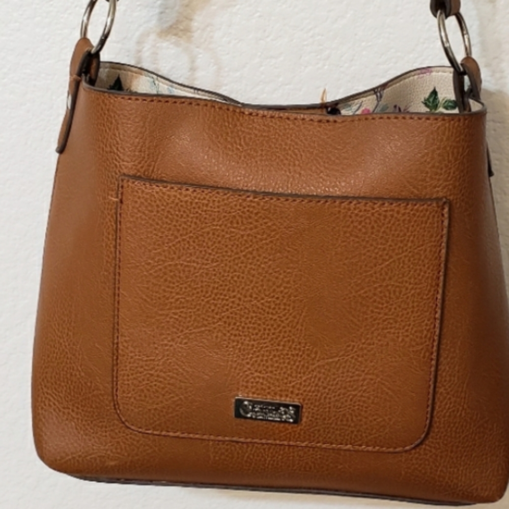 Crossbody Med brown purse, with matching pouch.